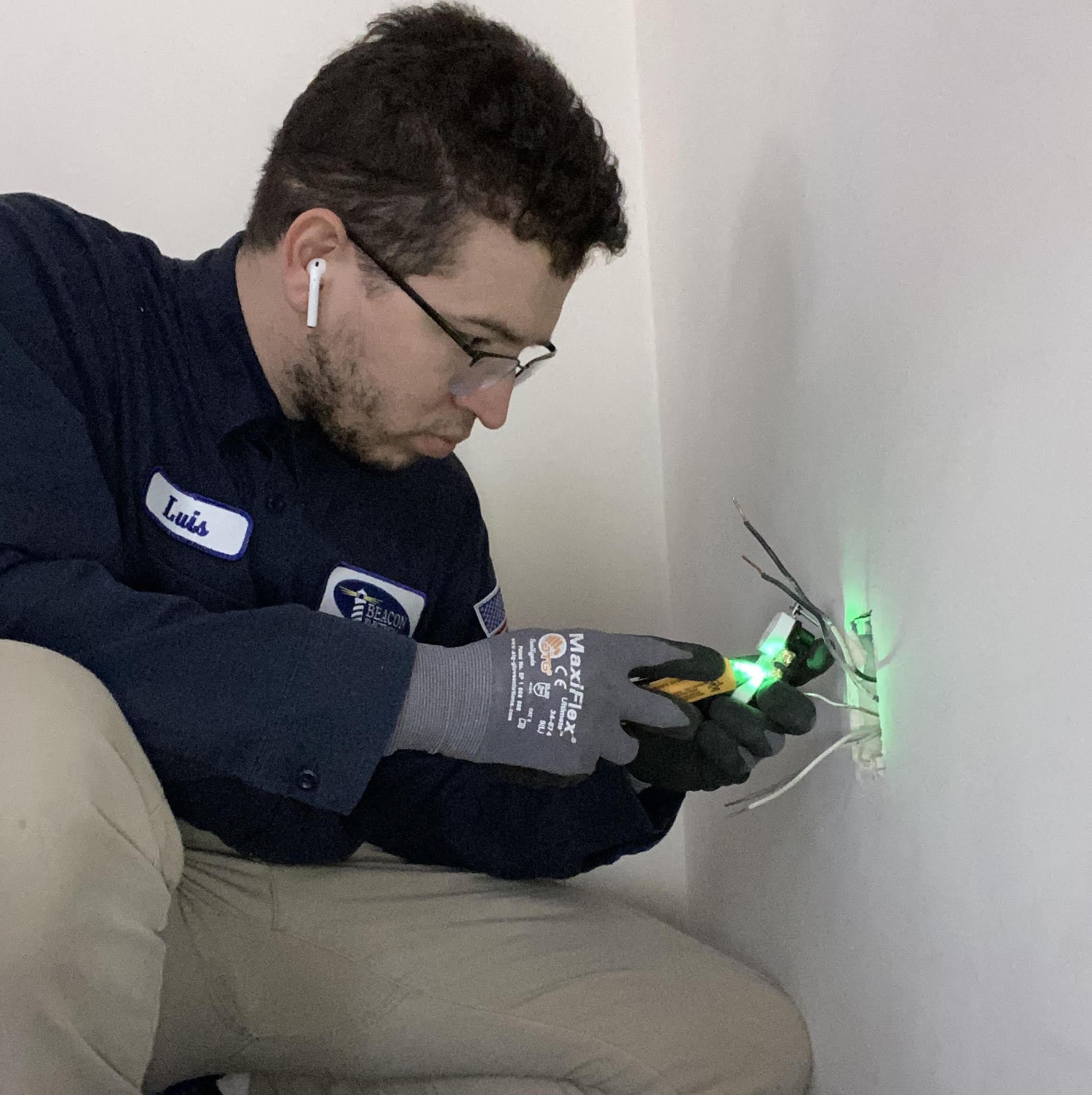 electrician fixing outlet