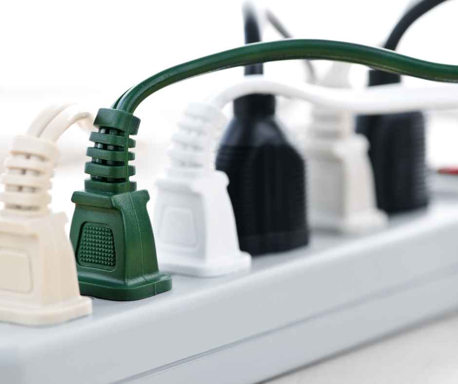 Surge protector with plugs in